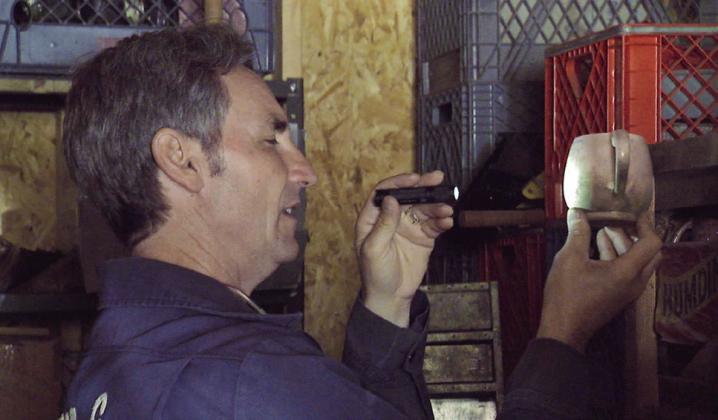 American Picker Frank Fritz rummages through Childress County Attorney Greg Buckley’s warehouse of eclectic items. Buckley’s collection, billed as “Law and Hoarder,” was the 121st episode in the “American Picker” series. It aired in August 2015 during the 13th season of “American Pickers.” Photo Courtesy of American Pickers