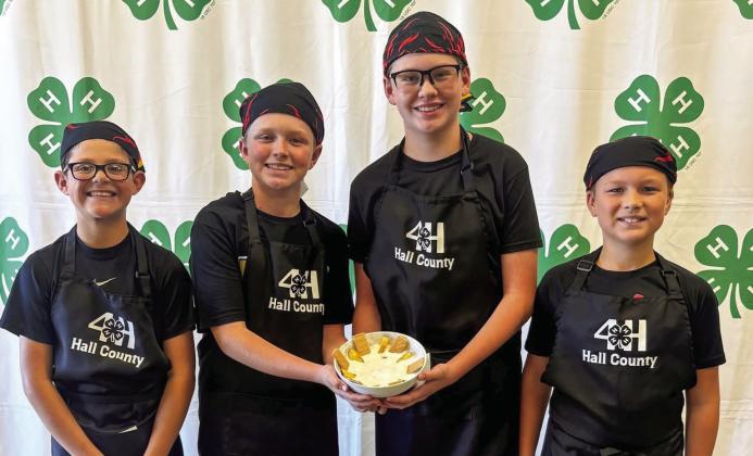 The Intermediate team of Kasyn Altman, Tucker Brooks, Murphy Cook and Ryder Wiles place fourth in the Healthy Dessert division, whipping up a creamy fruit dip.