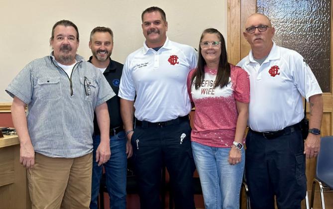 The City of Childress City Council, including Mayor Cary Preston and City Manager Kevin Hodges, welcomes Childress Fire Department Assistant Fire Chief Justin Willis Monday, Oct. 20. From left: Preston, Hodges, J. Willis, Misty Willis, Childress Fire Department Chief Ralph Freeman.