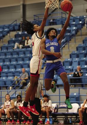 Childress’ Lamont Nickleberry attempts a layup against the Levelland Lobos during the Childress Rotary Holiday Invitational Thursday, Dec. 8. Childress High School Yearbook Staff