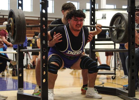 Bobcat Adrian Macias squats 465 pounds during the Childress High School Boys Powerlifting Invitational.