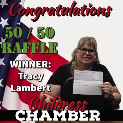 Tracy Lambert wins the recent Childress Chamber of Commerce 50/50 Raffle, collecting $5,000 in earnings, announced Tuesday, July 4 during the Fourth of July Party in the Park events. With only 200 tickets available for purchase, tickets were sold through the Childress Chamber of Commerce for $50. Photo Courtesy of Childress Chamber of Commerce