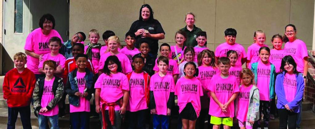 Wellington Elementary School second graders and their teaches, Debbie George and Becky Lampe, explore the Amarillo Zoo Wednesday, April 23. During the field trip, students watched Bagheera, a melanistic jaguar, trying to catch a ball in his habitat. Over 120 animals representing more than 70 species from around the world call the Amarillo Zoo home.