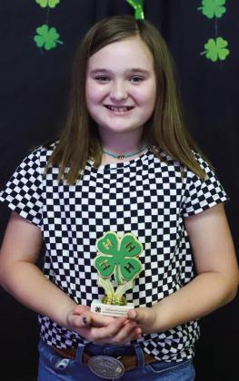 Presley Kemp receives the Junior Bronze Accomplishment Award, while Aison Skelton (not pictured) earns the Intermediate Bronze Accomplishment Award.