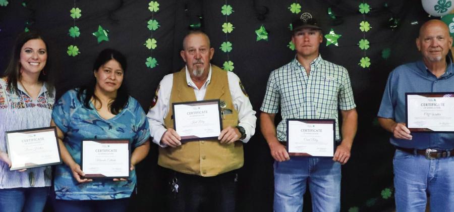 Adult leaders receive recognition for their loyal dedication and service to the 4-H youth, including Becca Holton, left, Marcela Estrada, Kent Riley, Creed Riley and Cliff Waller. Not pictured: Matt Needham, Marcie Orr, Brook Patterson, Lauren Patterson and Chad and Carrie Skelton. Photos Courtesy of Texas A&amp;amp;M AgriLife Extension Service of Collingsworth County