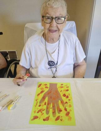 Despite triple digit temperatures, Memphis Convalescent Center residents got a taste of autumn Thursday, Aug. 17, painting fall trees. Only a week away, the official start of autumn begins Friday, Sept. 1. Photo Courtesy of Memphis Convalescent Center