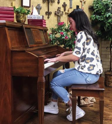 Sweetheart Summer Owens plays “Malagueña,” the piece she will perform in the talent competition of the Miss Texas Pageant in July.