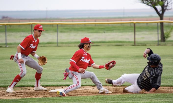 Senior Skyrocket pitcher TJ Salinas, alongside teammate Major Brown, gets the out at third base against the Memphis Cyclones for the district win. Salinas has been selected to play in the 2025 Native American All-Star Baseball Showcase, presented by the Native American Athletic Foundation in partnership with the Atlanta Braves. The Red River Sun/Shauna Salinas