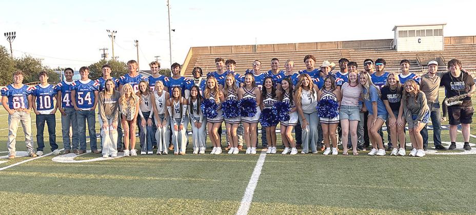 Childress Bobcat cheerleaders and football players greeted fans, parents, and the community on Tuesday.
