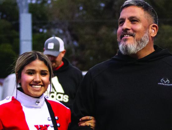 Lisette Vela is the daughter of Moy and Wendy Vela. She has been a member of the Rocket Regiment for five years.