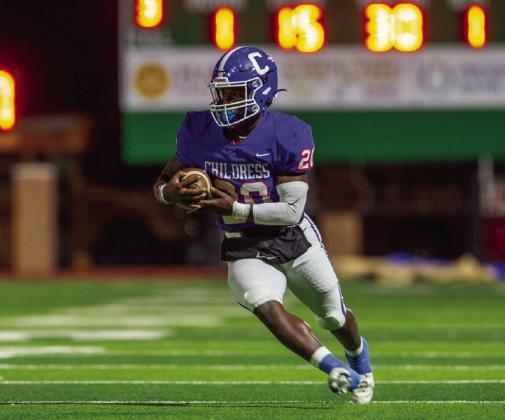 Da’Reon Mathis (20) moves the ball for the Bobcats during Childress’ 42-18 win over the Bulldogs.
