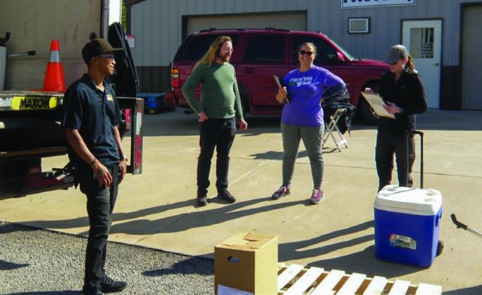 The Community Supplemental Food Program (CSFP) crew from High Plains Food Bank arrives in Childress for the monthly distribution to senior citizens. From left, Kwon Harris, CSFP Coordinator Josh Oldham, Rachel Maxwell and Andrea Johnson.