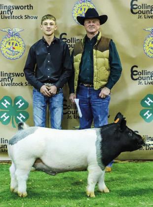 Travis Tillman displays his second-place class 3 cross swine with buyer Wellington State Bank, represented by Richard Sims.