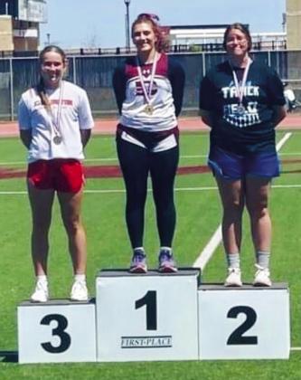 Junior Kaitlin Bawcom, left, throws bronze at the Region 1-2A Track and Field Championships Saturday, April 29 at West Texas A&amp;amp;M University. Courtesy Photos