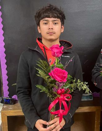Floral design students create multi-flower bud vases, mug arrangements