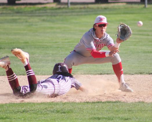 Wellington’s Lawson Inman attempts to out a Clarendon Bronco during the Skyrockets’ 4-3 fall Tuesday, April 21.