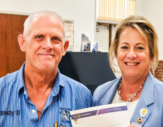 Lions District 2-T1 Governor Deanna Porter presents service pins to Memphis Lions Club members Wednesday, June 10. Receiving pins were Billy David Ballew, 45 years; Daniel Downey, 20 years; and Dickie Cloyd and Dick Hutcherson, 10 years. MEMPHIS LIONS CLUB