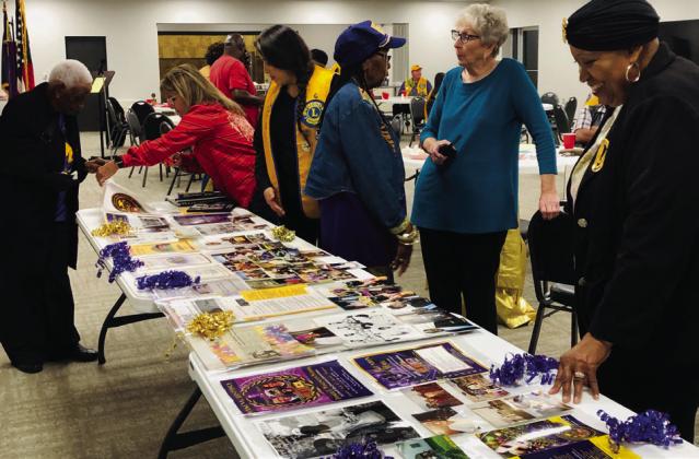 Wellington Lions welcome Booker T. Washington School history presentation