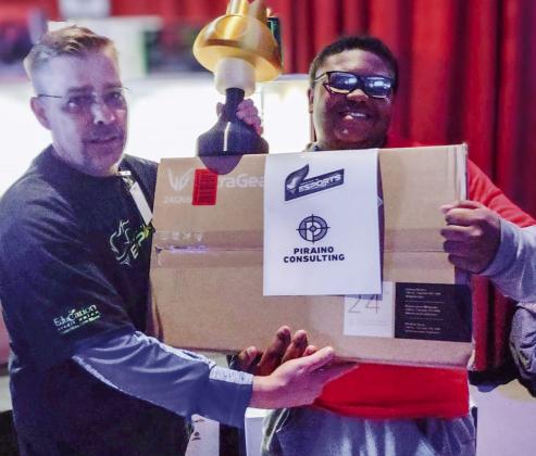 Sophomore Jontae Roland garners first place in Mario Kart at the Region 16 eSports Invitational Meet.