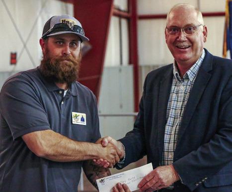 Lighthouse Electric Cooperative presents service awards to employees