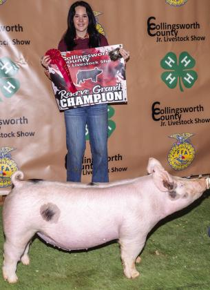 Kenady Skelton exhibits the Reserve Grand Champion Swine, purchased by Cattlemens Bank at the Premium Sale.