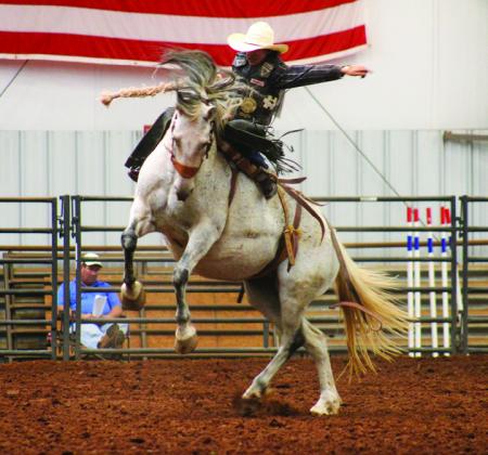Canyon’s Jaxson Owens competes in the high school saddle bronc riding during the Region 1 Texas High School Rodeo held at the Mashburn Event Center and Arena Saturday, Oct. 22 and Sunday, Oct. 23. The Red River Sun/Elizabeth Tanner