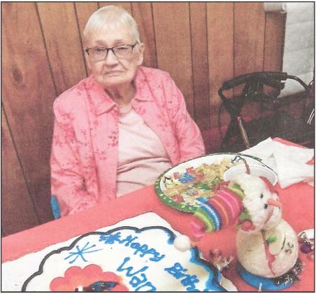 Wanda Warner celebrates her 91st birthday during the Childress Senior Citizens annual Christmas luncheon Thursday, Dec. 15, a few days prior to her official birthday Sunday, Dec. 18. Roughly 75 individuals were on hand for the luncheon, singing 'Happy Birthday' to Warner. Photo by Grace Holman