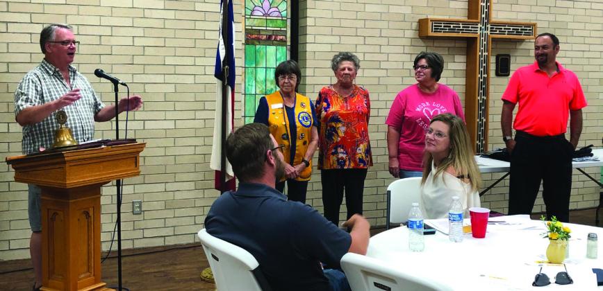 Lion Neal Odom, left, leads in singing “Happy Birthday” to Nita Day, Fraya Hammons, Lori Moore and Gene Pena during the Sept. 19 meeting with guests Brandon Powers and Nicole Tyler. The Red River Sun/Bev Odom
