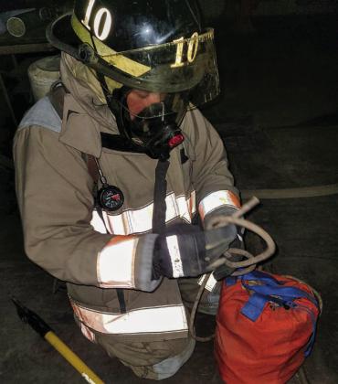 The Childress Fire Department, along with the Paducah Fire Department, trains Tuesday, Dec. 27. Training included performing a blackout search-and-rescue, as well as improving dexterity and follow-the-hose-line training. The two fire teams have been training together for the past few months, according to the Childress Fire Department. Photos Courtesy of the Childress Fire Department