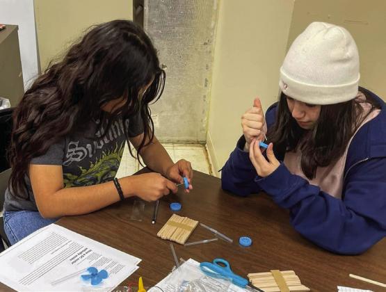 Middle school students build direct current vehicles