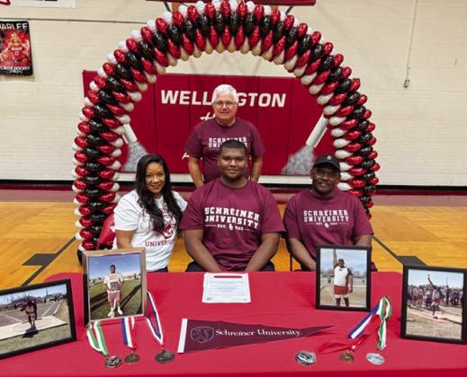Wellington High School senior Jovani Munn signs a National Letter of Intent to continue his track career at Kerrville’s Schreiner University Friday, May 9. From left: mother and step-father Hope and John O’Rear; Munn; father Joe Bill Munn. Wellington High School