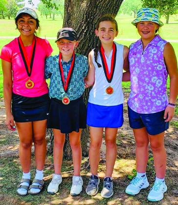 Junior high girls, from left: Camila Quinonez, Quanah, first place; Asher Brewer, Altus, Okla., second place; Emma Wynn, Altus, Okla., third place; Tandy Hughes, Roaring Springs, fourth place. Photos Courtesy of Greenbelt Jr. Golf Association