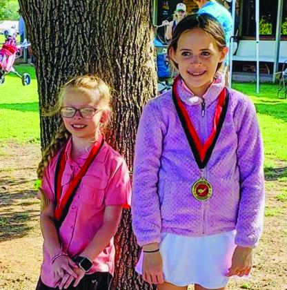 Kindergarten through third-grade girls, from left: Jaklyn McGee, Childress, second place; Blair Ward, Wellington, first place. Not pictured: Helen Plummer, Altus, Okla., third place.