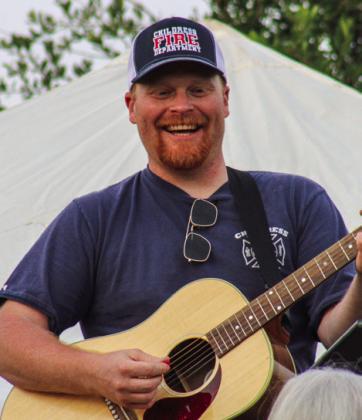 Childress Fire Department volunteer firefighter Jim Lile performs at the first-ever Childress Fire Department benefit concert Saturday, May 20 at Fair Park. The Red River Sun/Elizabeth Tanner