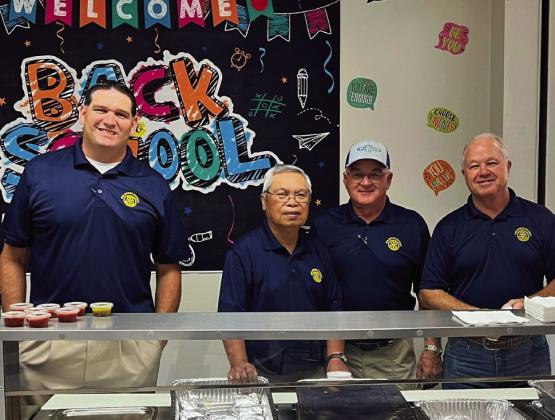 Photo Courtesy of Childress Rotary Club Childress Rotary Club hosts a back-to-school breakfast for Childress Independent School District (ISD) staff Friday, Aug. 12. At the breakfast, Rotarian and United Supermarkets Manager Justin Pierce, left, and his staff and United Supermarkets, served burritos and fruit trays to Childress ISD staff.