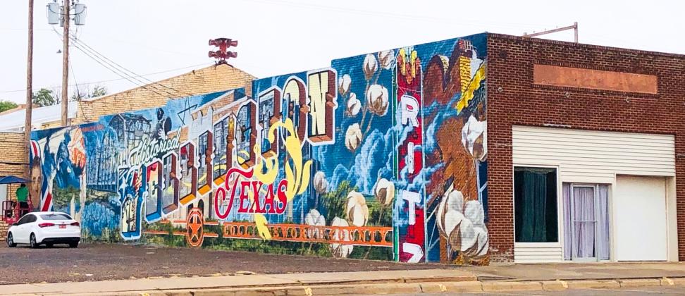 Located at 915 West Ave., muralist Malcom Byers creates the face of the Duke of Wellington on the western edge of the mural design Tuesday afternoon, Aug. 26 in the 72-degree temperatures. The Red River Sun/Bev Odom