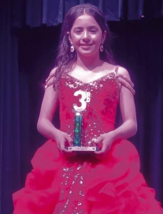 Wellington Junior High School sixth-grader Hazel Estrada garners third place in the 76th St. Patrick’s Lad n’ Lassie Preteen Pageant. Courtesy Photo