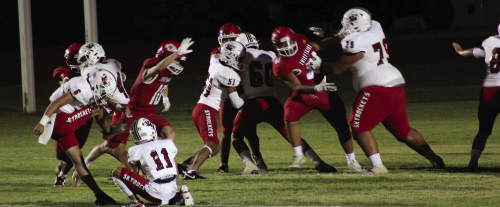 Wellington’s offensive line, including TJ Salinas (11), Major Brown (6), Noah Cantu (4), Kingston Molina (51), RJ Granadoz (60), Nick Nevarez (79) and Caleb Strickland (8), hold Friona to only one touchdown Friday night, Sept. 13 for the 42-7 win. The Red River Sun/Shauna Salinas