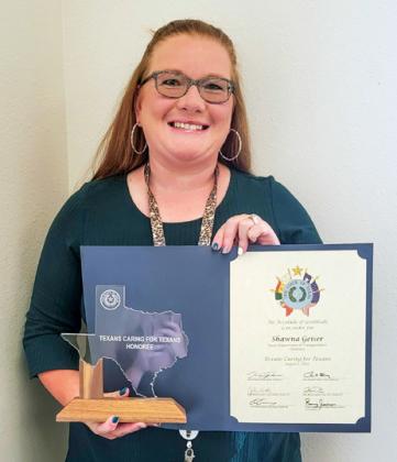 Texas Department of Transportation (TxDOT) ChildressDistrictMaintenance Support Tech Shawna Geiser is a 2023 Texans Caring for Texans award recipient. Geiser was recognized for making sure families who are unable to travel during the Thanksgiving holiday have a traditional Thanksgiving meal.