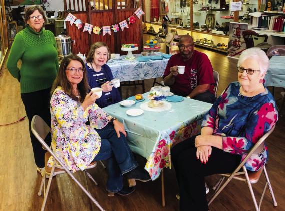 Collingsworth County Museum volunteer Glenda Anglin, left, and curator Karen Caldwell visit with guests Sharon Venable, Robert Powell and Nancy Harris during the afternoon tea party on Friday, March 17. “All in attendance had a good time,” Caldwell said. “If you still haven’t had a chance to see our great little doll exhibit, come on by! We have over 100 dolls on display.” The Red River Sun/Bev Odom
