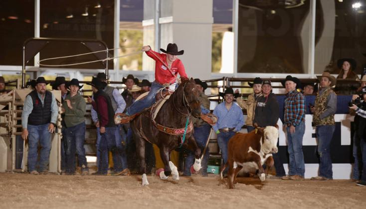 Colee Cox, on her horse, Rouge, competes in the 19-andunder girls breakaway roping during the Junior World Finals in Las Vegas, Nev.