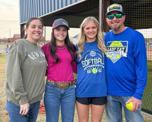 The Childress Lady Cat softball team enjoys a family and team dinner, hosted by parents of the players, Monday, March 23.