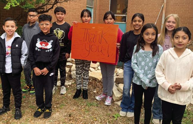 Austin Elementary School students thank Thriftway for the recent donation of water prior to the State of Texas Assessments of Academic Readiness (STAAR) test. Photo Courtesy of Memphis ISD