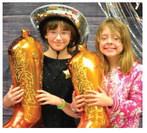 Photos Courtesy of Wellington Elementary School Students and staff observe the recent Red Ribbon Week. In an effort to heighten drug free awareness, daily themes evolved as follows: Monday, in our drug free era, Barbie and Ken; Tuesday, make America drug free, USA and olympic day; Wednesday, boots and bling stay clean, rhinestone cowboy; Thursday, scare away drugs, halloween costumes; Friday, Rockets are drug free, red out.