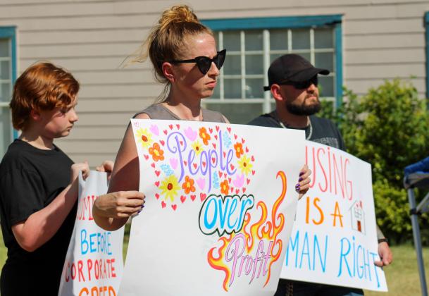 Community members organized a peaceful protest due to the recent evictions of residents at the 75-unit Madison Chase apartment complex Friday, July 10. ELIZABETH TANNER/THE GREENBELT INTREPID