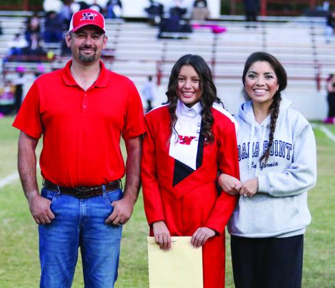 Prior to the final home football game, Wellington High School recognized seniors active in football, cheerleading and band Friday, Oct. 25. Noemi Arianna Pena is the daughter of Gene and Noemi Pena. She has been a member of the Rocket Regiment for five years.