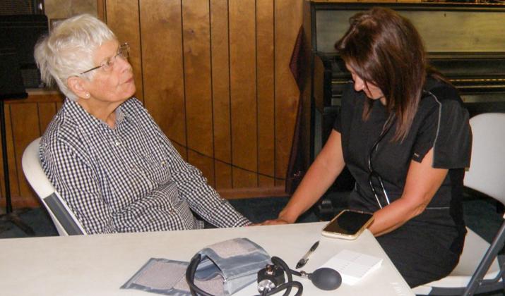Nurse provides health checks