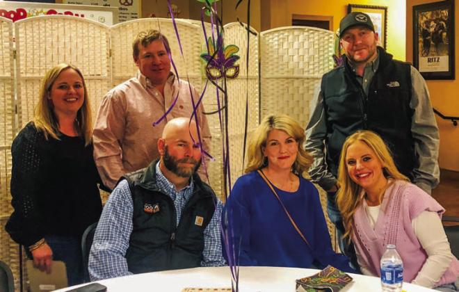 Rebecca and Taylor Allred, left, Rusty and Alison Strickland, Mark and Haley Lemons.