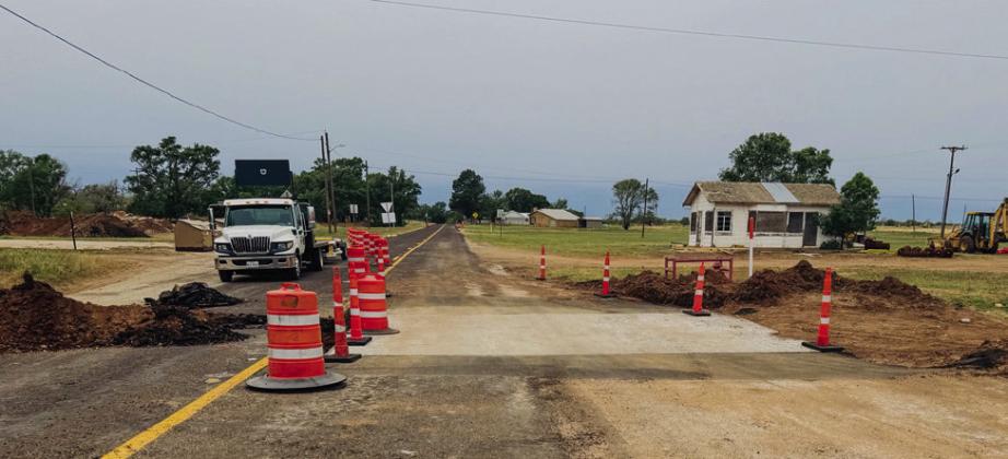 Next, workers prepare the eastbound lane for the cement base as part of the highway upgrade, where new sidewalks are being constructed to allow for the widening of FM 338.