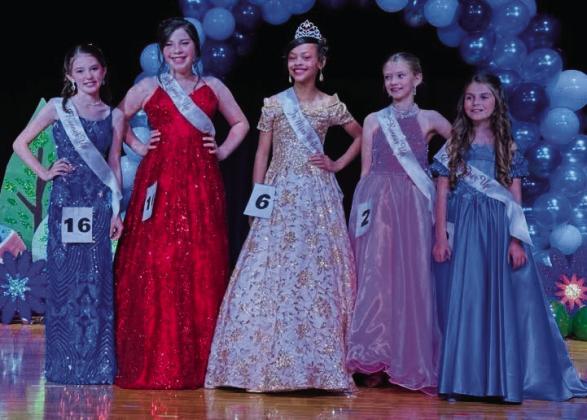 Junior Miss Wellington 2025 Alaeja Archie, center, surrounds herself with third runnerup Peyton Roberson, left, first runner-up Callahan Cantu, second runner-up Calleigh Henard and fourth runner-up Jenna Faulks.